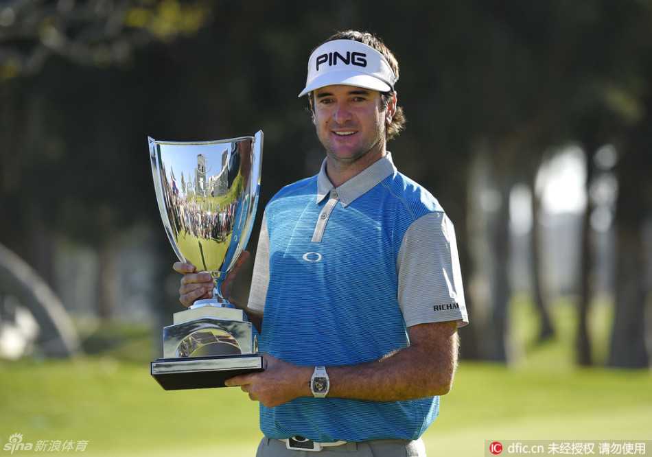 冠军的温柔：丹尼·威利特怀抱着刚出生的儿子，绿夹克与新生儿构成了人生最荣耀温馨的画面