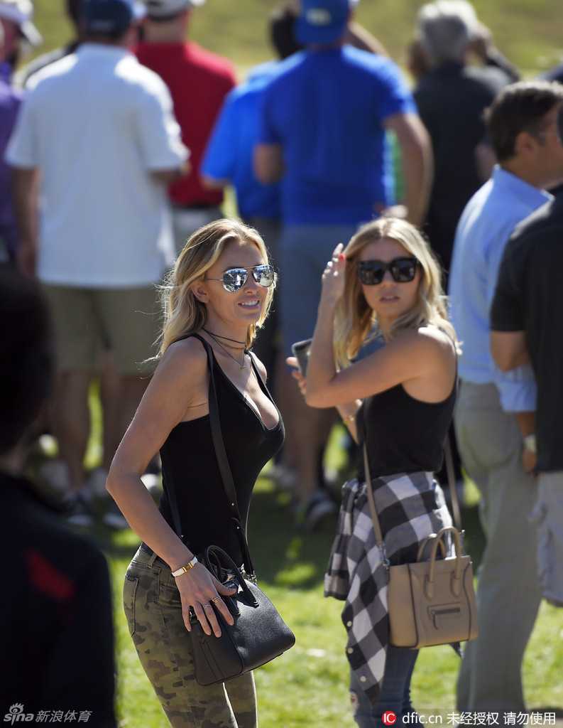 凝望失落：罗里·麦克罗伊在果岭上推杆后，表情凝重，对错失的机会流露出深深的失望